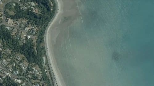 Live Ruby Bay surf cam showing spot conditions.